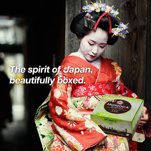 Woman in traditional Japanese attire holding a box with 'Momoca' branding.