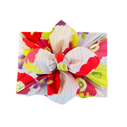 Colorful headband with a bow on a white background